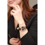 Montre femme noir et or